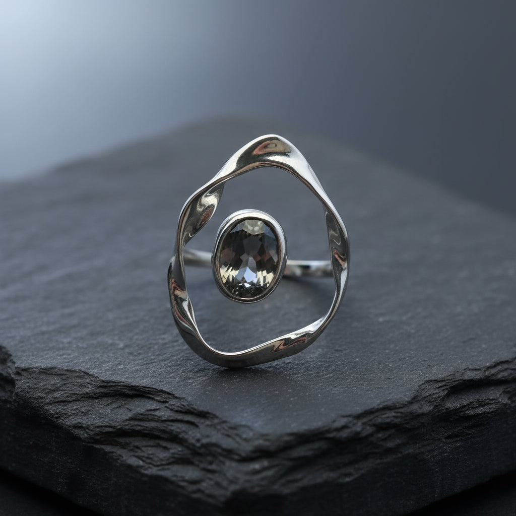 Chrome Orbit: Jet-Black Oval Ring