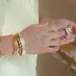 Sunlit Bloom: Oval CZ Flower Ring